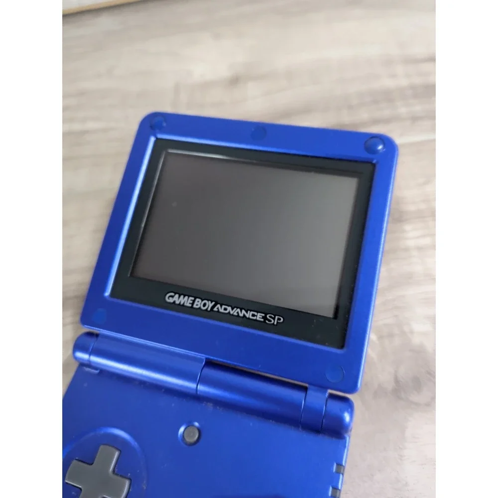 Nintendo Game Boy Advance SP Blue ( FOR PARTS OR NOT WORKING )